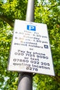 Pay and display bays Belgravia district street London UK Royalty Free Stock Photo