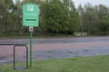 Pay and display carpark sign pay ticket fine vehicle safe park spaces empty car park