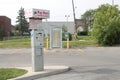 tor, canada - July 26, 2023: pay here patrolled and enforced 24 hours 7 days rectangle sign above pay meter. P Royalty Free Stock Photo