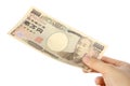 Pay a Japanese 10000YEN bill Royalty Free Stock Photo