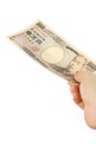 Pay a Japanese 10000YEN bill Royalty Free Stock Photo