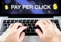 Pay Per Click (PPC) word on notebook screen with hand type on keyboard, Digital marketing business concept