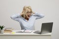 Pay raise. Overjoyed female office worker looking at laptop screen with excitement, happy after her salary increased