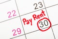 Pay rent is written on calendar