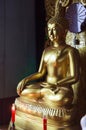 Payathonsu, Myanmar - December 30, 2018: Vintage Golden Gilded Buddha image statue at Tai Ta Ya Monastery, Buddhist Temple. Day