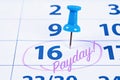 Payday concept. Business, finance, savings money. Calendar with marker circle in word payday