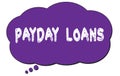 PAYDAY LOANS text written on a violet cloud bubble