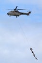 Swiss Air Force Aerospatiale AS532 TH98 military utility helicopter T-340 transporting troops by rope suspension