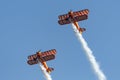 Breitling Wing walkers barnstorming flying display in vintage Boeing Stearman biplanes Royalty Free Stock Photo