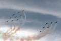 Patrouille Suisse formation display team of the Swiss Air Force flying Northrop F-5E fighter aircraft joined by the Swiss PC-7 tea