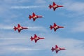 Patrouille Suisse formation display team of the Swiss Air Force flying Northrop F-5E fighter aircraft joined by the Swiss PC-7 tea