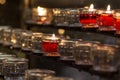 Votive Candles in Church, Red. Royalty Free Stock Photo