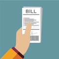 Paying bills, hand holding bills vector