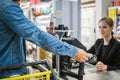 Paying with contactless card in a grocery store