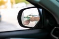 Paying money for gas staion cashier, view from inside car image Royalty Free Stock Photo