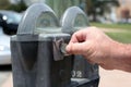 Paying the parking meter Royalty Free Stock Photo