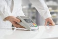 Paying with payment terminal in pharmacy