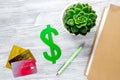 Paying for studing concept with dollar sign and cards on light table background top view Royalty Free Stock Photo