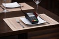 Payment with credit card. Credit card terminal on plate