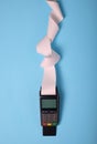 Payment terminal on a blue background Royalty Free Stock Photo