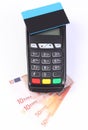 Payment terminal with contactless credit card and currencies euro. cashless paying for shopping or products concept Royalty Free Stock Photo