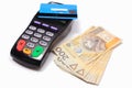 Payment terminal with contactless credit card and money Royalty Free Stock Photo