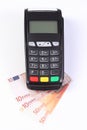 Payment terminal, credit card reader with currencies euro, cashless paying for shopping or products Royalty Free Stock Photo