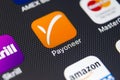 Payoneer application icon on Apple iPhone 8 smartphone screen close-up. Payoneer app icon. Payoneer is an online electronic