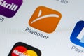 Payoneer application icon on Apple iPhone X smartphone screen close-up. Payoneer app icon. Payoneer is an online electronic paymen