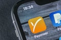 Payoneer application icon on Apple iPhone X smartphone screen close-up. Payoneer app icon. Payoneer is an online electronic