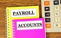 Payroll and accounts. Text labels on the folders of accounting documents