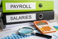 Payroll, Salaries. Binder data finance report business with graph analysis in office