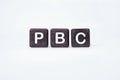 PBC Primary biliary cholangitis word on cubes on a white background Royalty Free Stock Photo