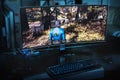 PC gaming concept - an ultrawide screen on a dark room with the Fallout 76 game on it in Bologna, Italy, 04 September Royalty Free Stock Photo