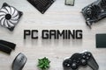 PC gaming flat lay scene with text and gaming computer components and joypad