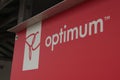 tor, canada - July 2, 2023: pc optimum sign with pc logo shot on angle, red and white with dark background-