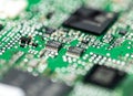 PCB printed circuit board close-up shot with a lot of electronic components Royalty Free Stock Photo