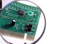 pci Network card in magnifier Royalty Free Stock Photo