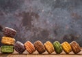 10 pcs moldy macaroons on wood table