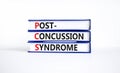 PCS post-concussion syndrome symbol. Concept words PCS post-concussion syndrome on books on a beautiful white table white