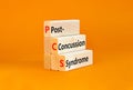 PCS post-concussion syndrome symbol. Concept words PCS post-concussion syndrome on wooden blocks on beautiful orange table orange