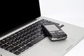 PDA Phone on Laptop Royalty Free Stock Photo