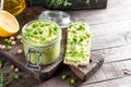 Pea green dip on a crackers. Hummus concept. Top view. Copy space Royalty Free Stock Photo