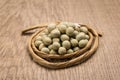 Pea. Paper rope around grain. Selective focus. Royalty Free Stock Photo