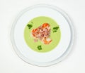 Pea soup with shrimps and bacon Royalty Free Stock Photo