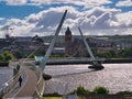 The Peace Bridge across the River Foyle in Derry - Londonderry in Northern Ireland, UK.