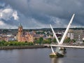 The Peace Bridge across the River Foyle in Derry - Londonderry in Northern Ireland, UK.