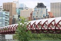 Peace bridge with building in the background in Calgary, Alberta