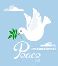 Peace dove with an olive branch for the International Peace Day poster. Flat design.