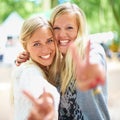 Peace hands, portrait and women friends hug in a park with freedom, fun and bonding in nature together. V sign, face and